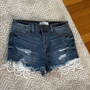 Mudd Women's Dark Blue Distressed Denim Shorts with White Lace Trim pockets